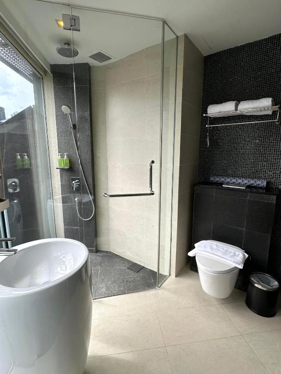 Koupelna v ubytování D'Hotel Singapore managed by The Ascott Limited