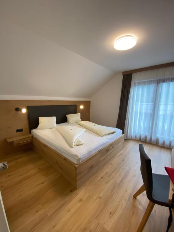 Postel nebo postele na pokoji v ubytování Haus Schluder - Familie Stanitzer