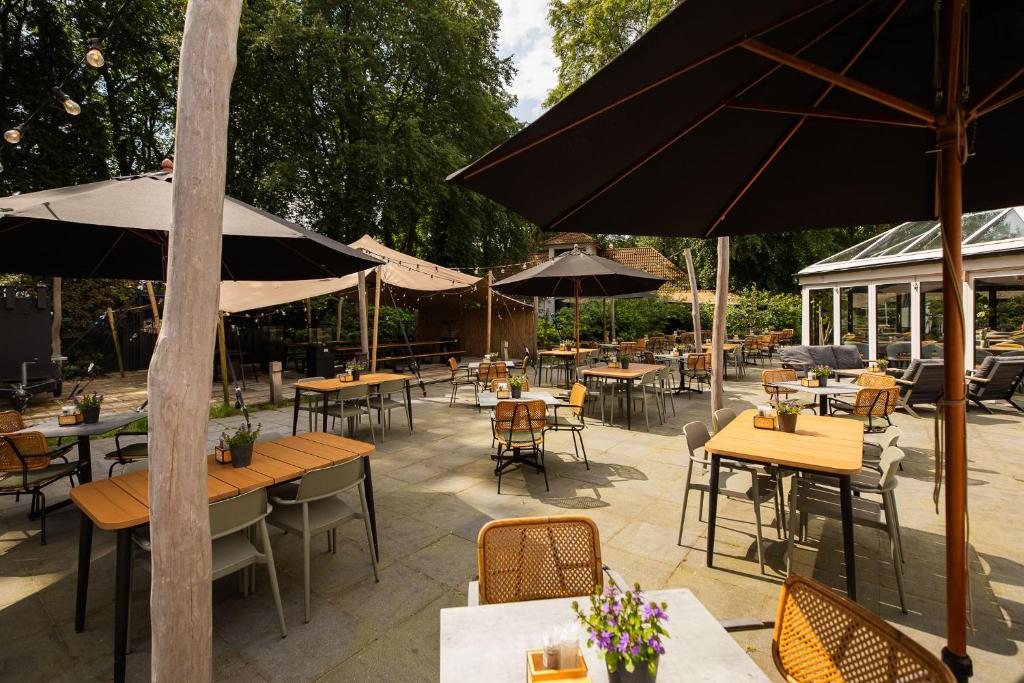 Een restaurant of ander eetgelegenheid bij Veluwe Hotel De Beyaerd