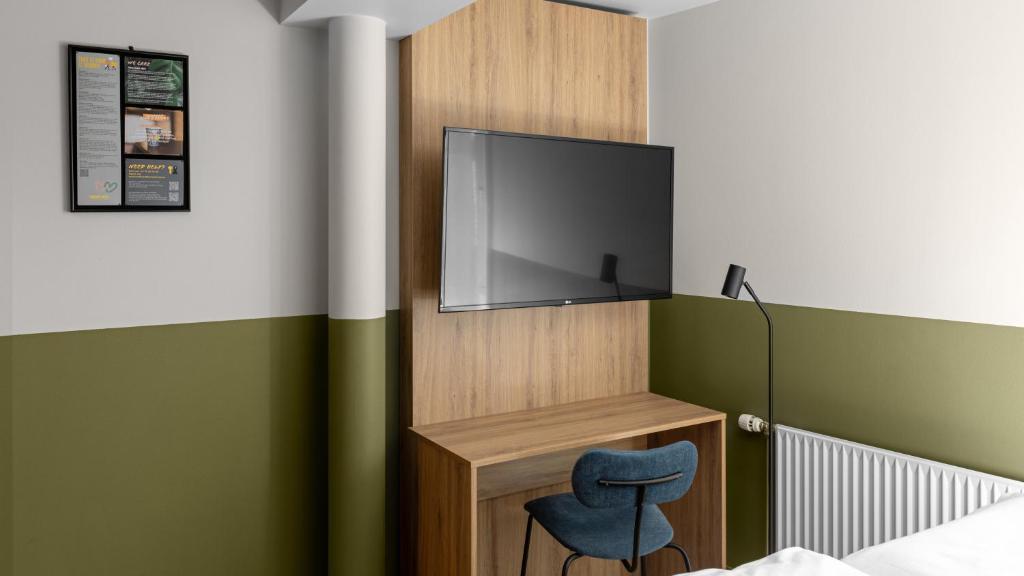 TV a/nebo společenská místnost v ubytování Comfort Hotel Trondheim