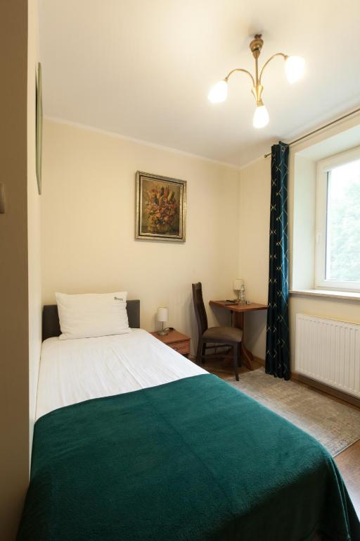 Postel nebo postele na pokoji v ubytování HOTEL I RESTAURACJA BROCHÓW