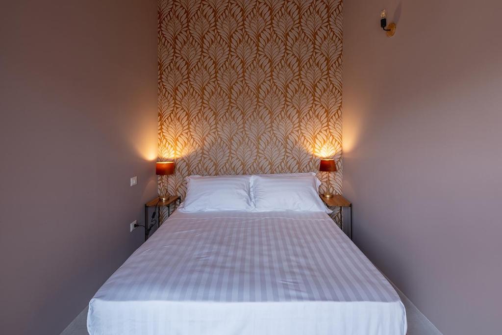 Letto o letti in una camera di Albergo Diffuso Borgo La Terra
