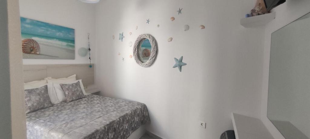 Postel nebo postele na pokoji v ubytování Doron Hotel Delfini