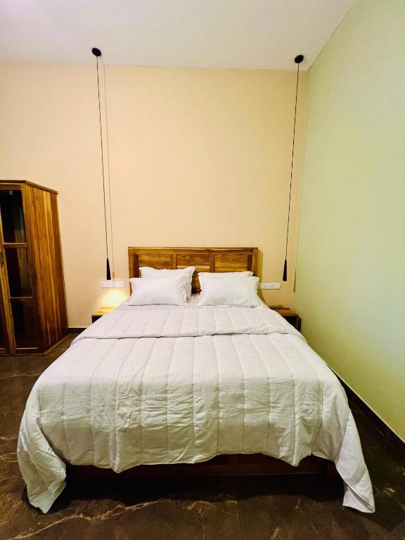 Postel nebo postele na pokoji v ubytování Sound Sleep Resort