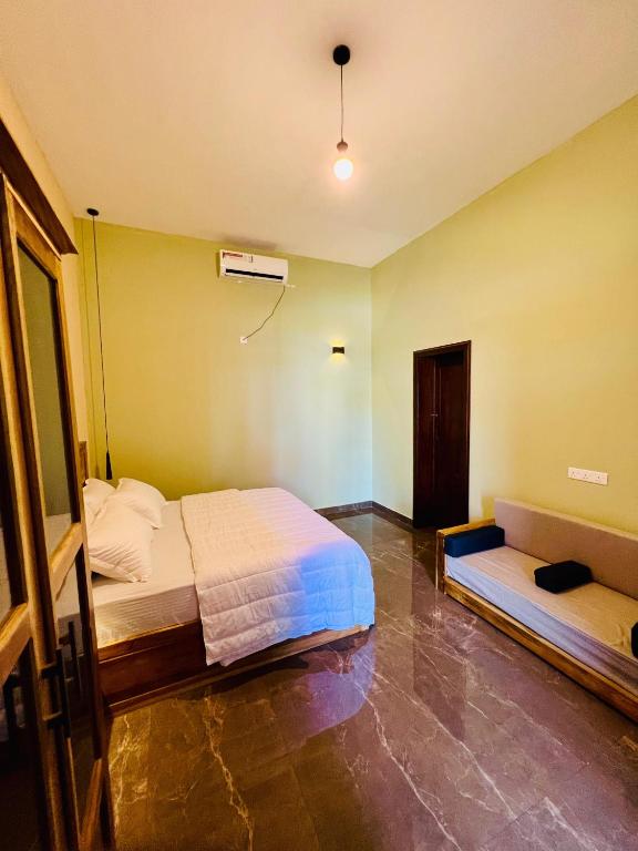 Postel nebo postele na pokoji v ubytování Sound Sleep Resort