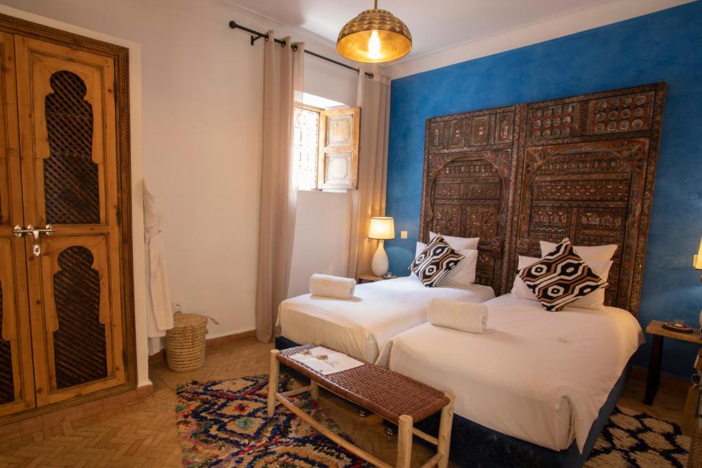 Postel nebo postele na pokoji v ubytování Riad Dar Fanny