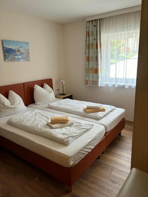 A bed or beds in a room at Eckenhof