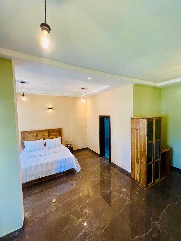 Postel nebo postele na pokoji v ubytování Sound Sleep Resort