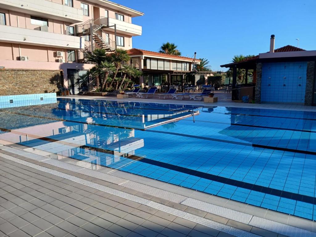 Bazén v ubytování Green Sporting Club Hotel nebo v jeho okolí