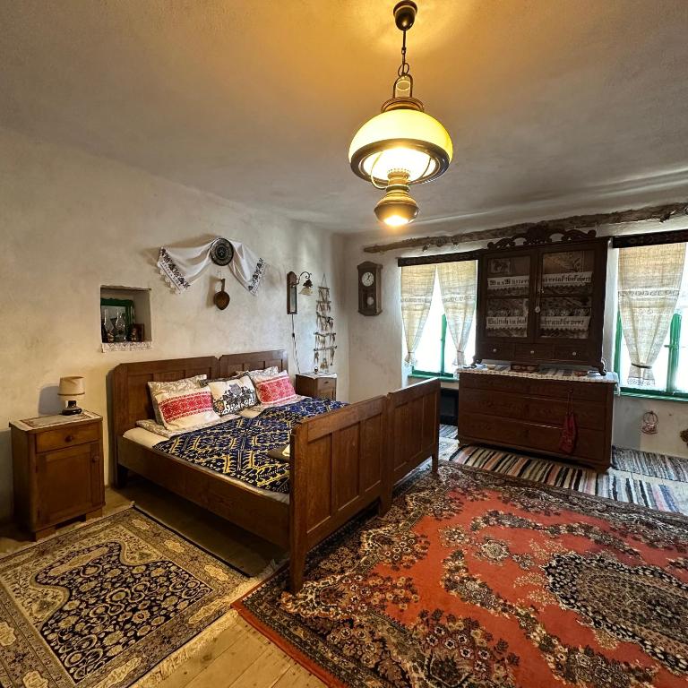 Postel nebo postele na pokoji v ubytování Saschiz 175 GuestHouse