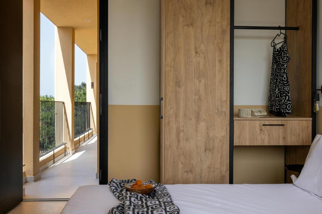 Postel nebo postele na pokoji v ubytování Marea Luxury Suites