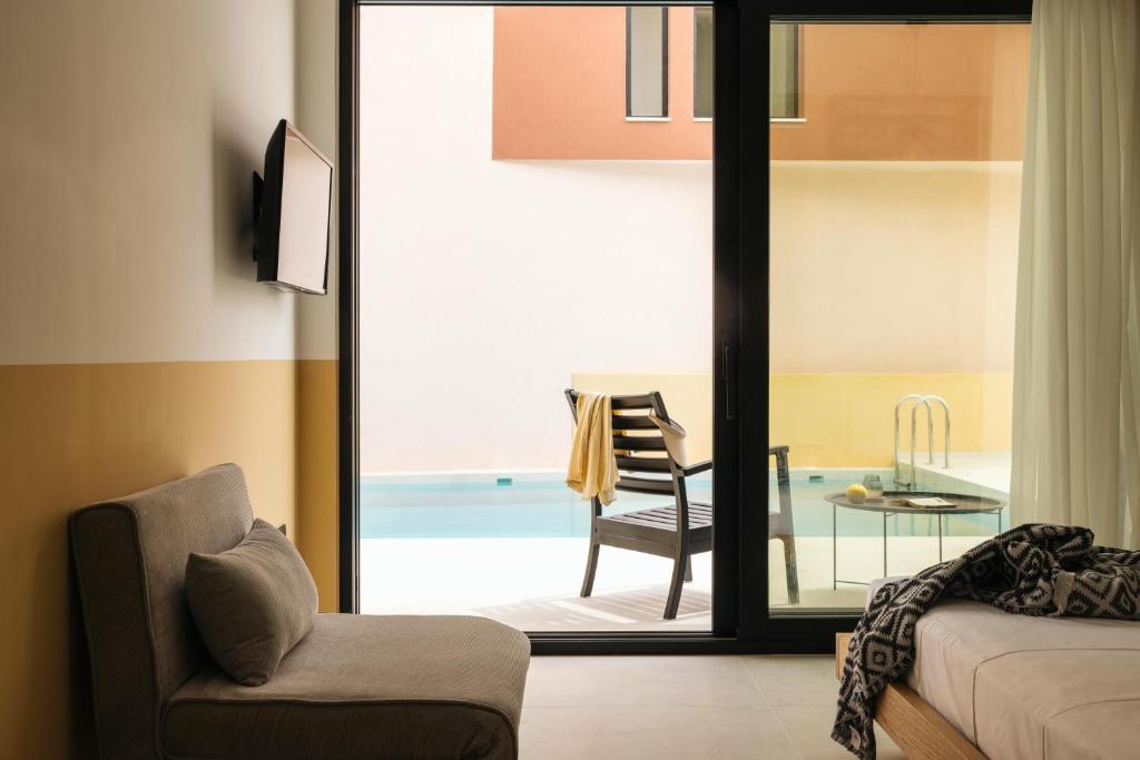 Postel nebo postele na pokoji v ubytování Marea Luxury Suites