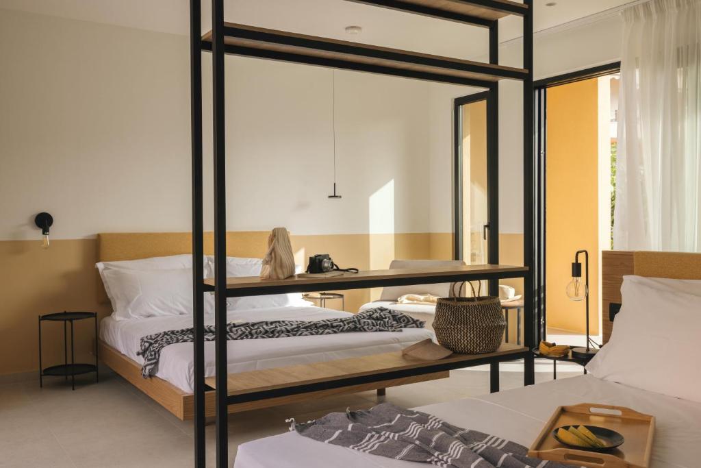 Postel nebo postele na pokoji v ubytování Marea Luxury Suites