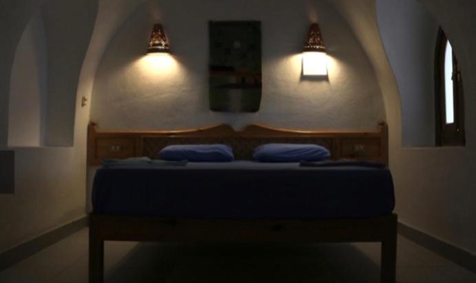 Postel nebo postele na pokoji v ubytování Aqua Sun