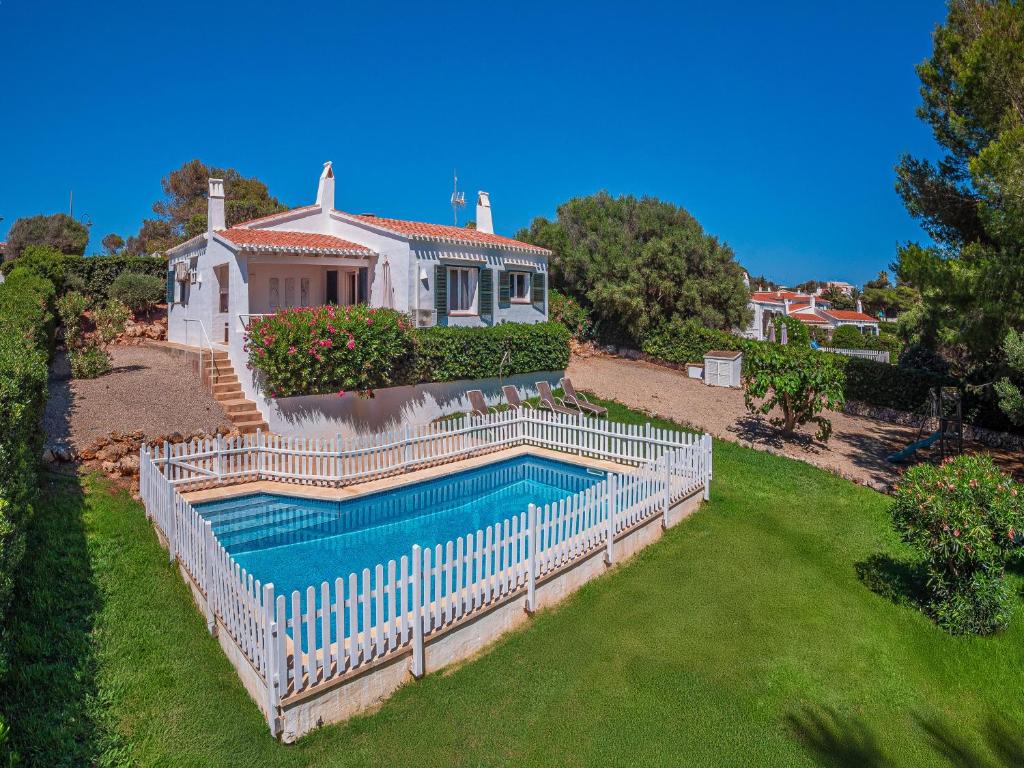 an aerial view of a house with a swimming pool at Bini Belin by 3VILLAS in Binibeca