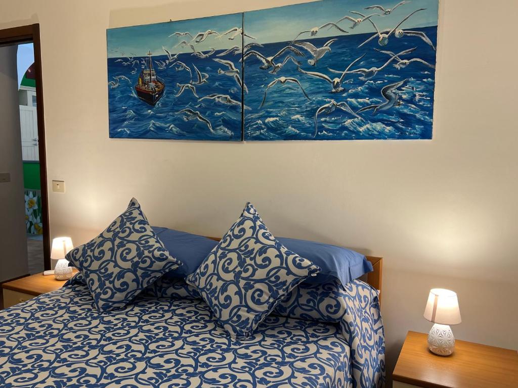 Postel nebo postele na pokoji v ubytování Casa Calandra
