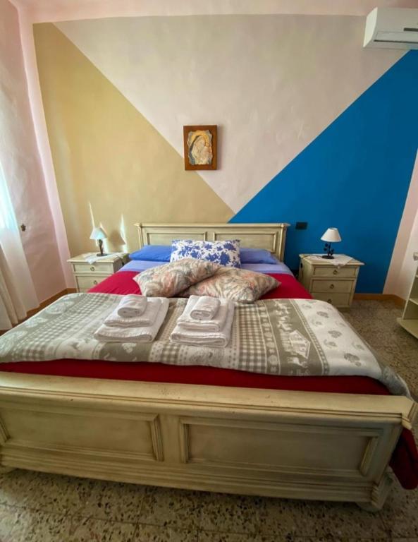 Postel nebo postele na pokoji v ubytování I Due Cipressi