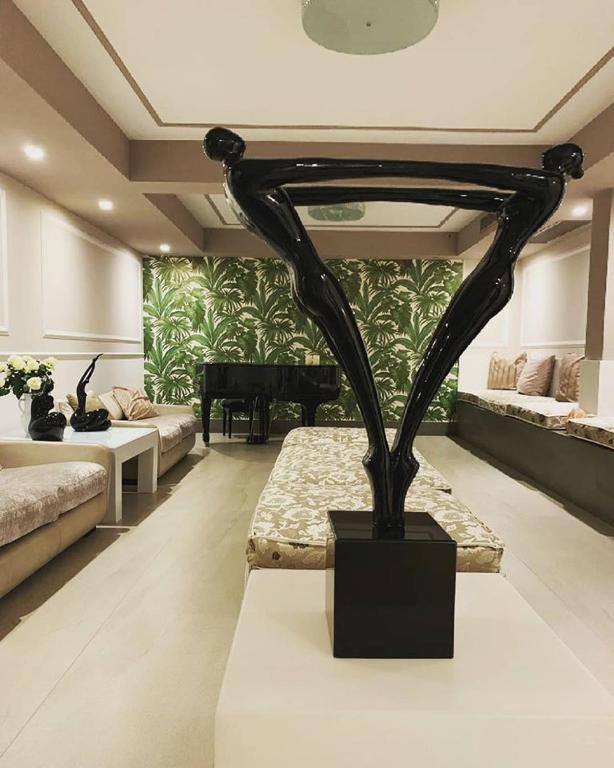 Voodi või voodid majutusasutuse Bianco Riccio Suite Hotel toas