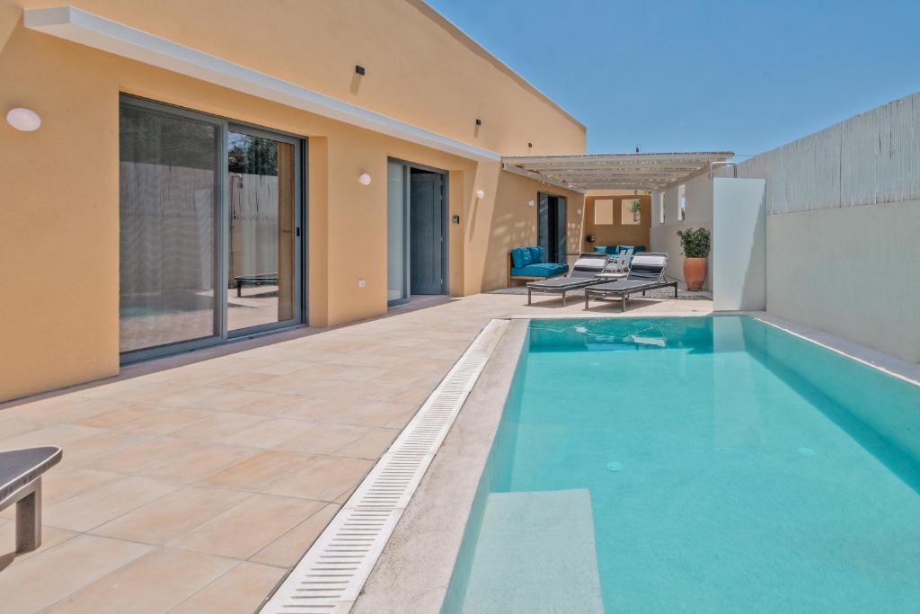 Bazén v ubytování Tessera Villas & Studios Collection nebo v jeho okolí