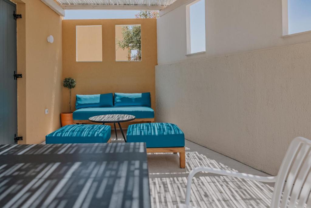 Posezení v ubytování Tessera Villas & Studios Collection