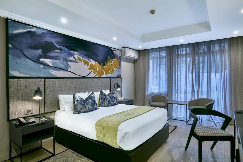 Postel nebo postele na pokoji v ubytování Cresta Thapama Hotel