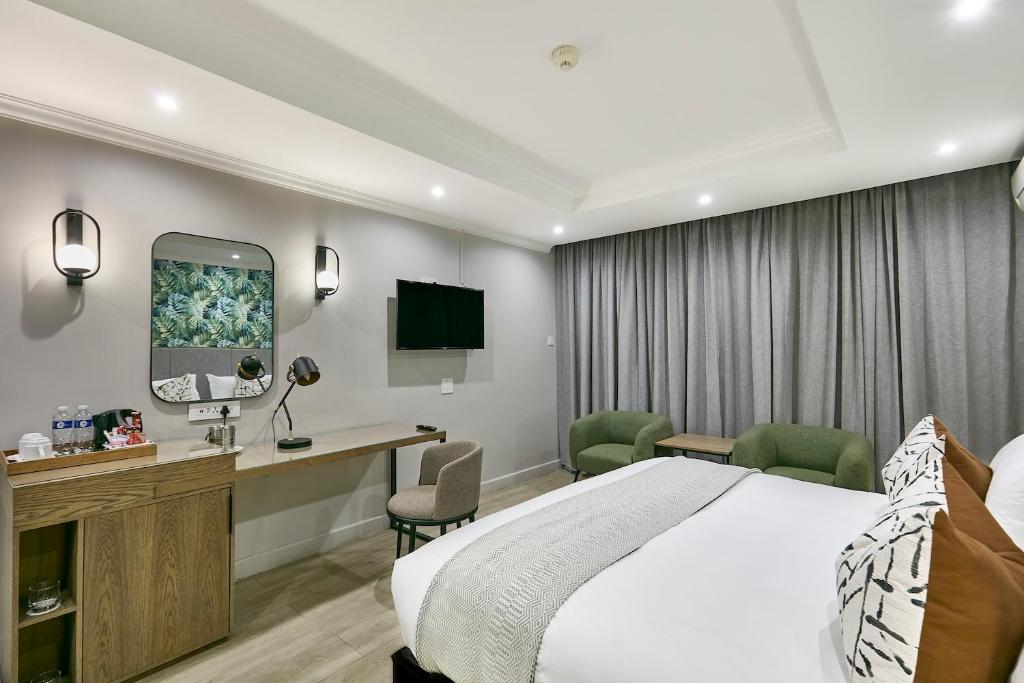 TV a/nebo společenská místnost v ubytování Cresta Thapama Hotel