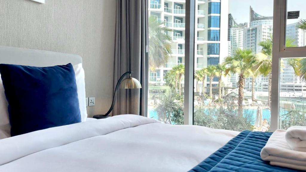 Postel nebo postele na pokoji v ubytování Vacay Lettings - Damac Prive studio