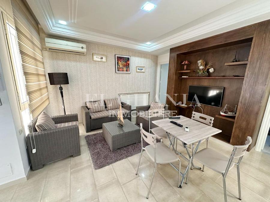 TV a/nebo společenská místnost v ubytování Vacances Appartement Carolina