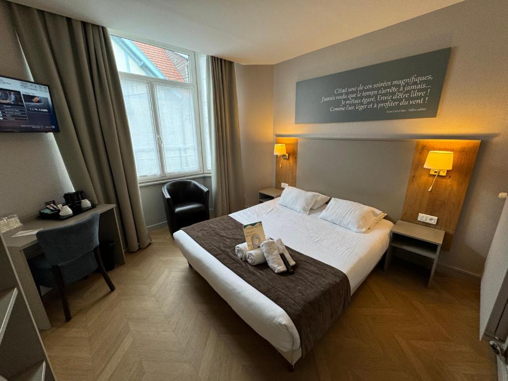 Postel nebo postele na pokoji v ubytování Hôtel Villa Des 2 Caps