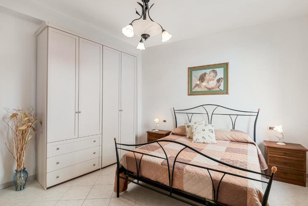Postel nebo postele na pokoji v ubytování Casa Fuori di Mare