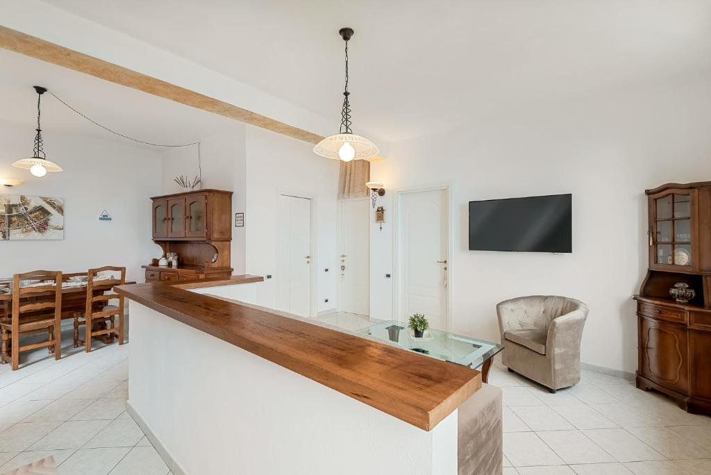 TV a/nebo společenská místnost v ubytování Casa Fuori di Mare