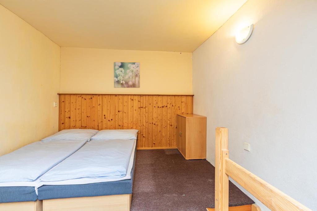 Postel nebo postele na pokoji v ubytování Hotel Sobol