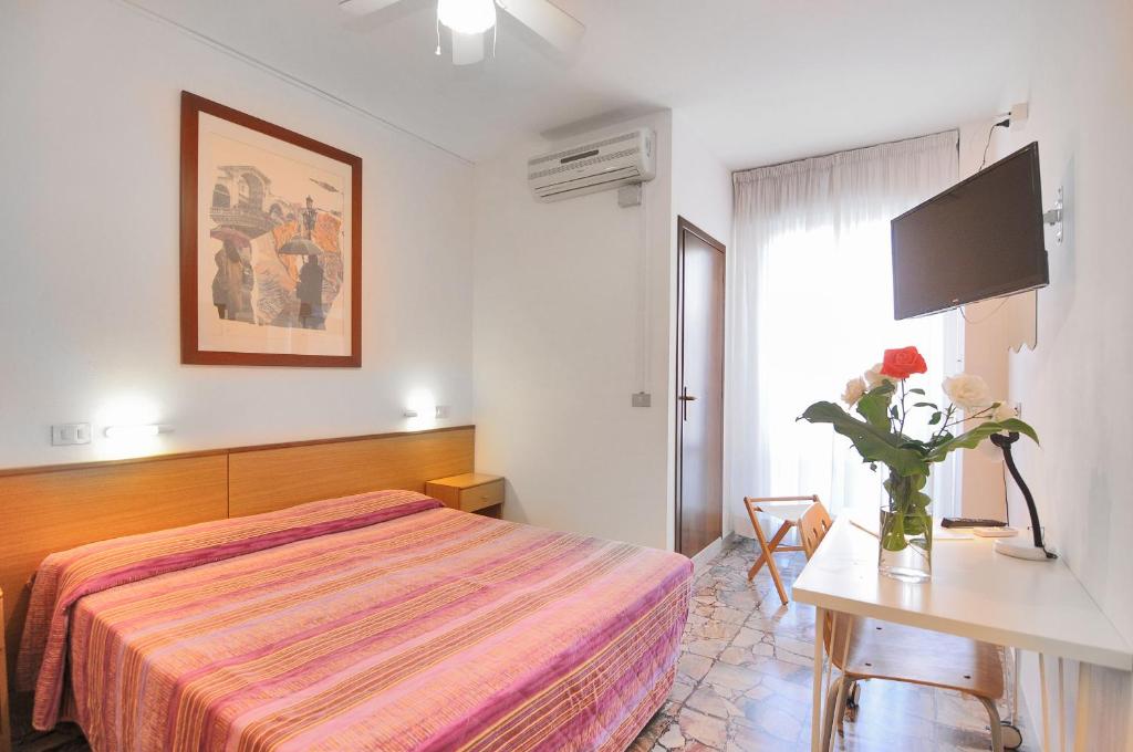 Postel nebo postele na pokoji v ubytování Hotel Itta