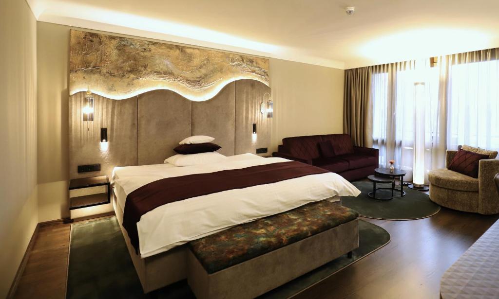 Postel nebo postele na pokoji v ubytování Hotel Waldkrug