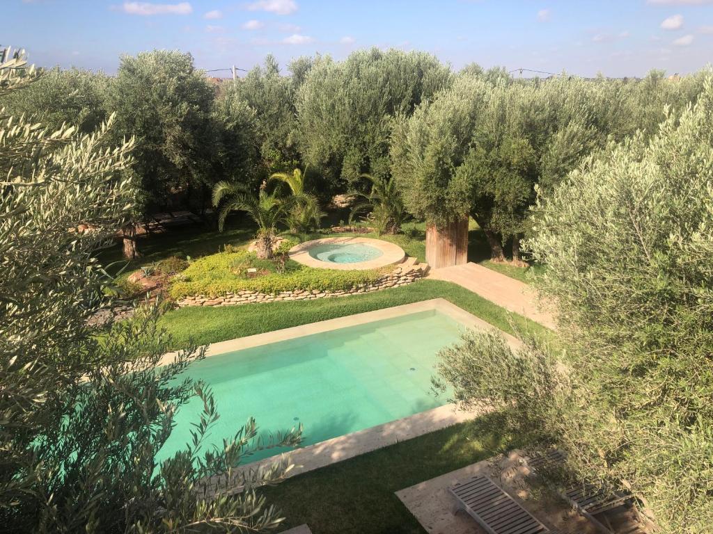 Bazén v ubytování Jardin Sakina - Chambre d'hôtes nebo v jeho okolí