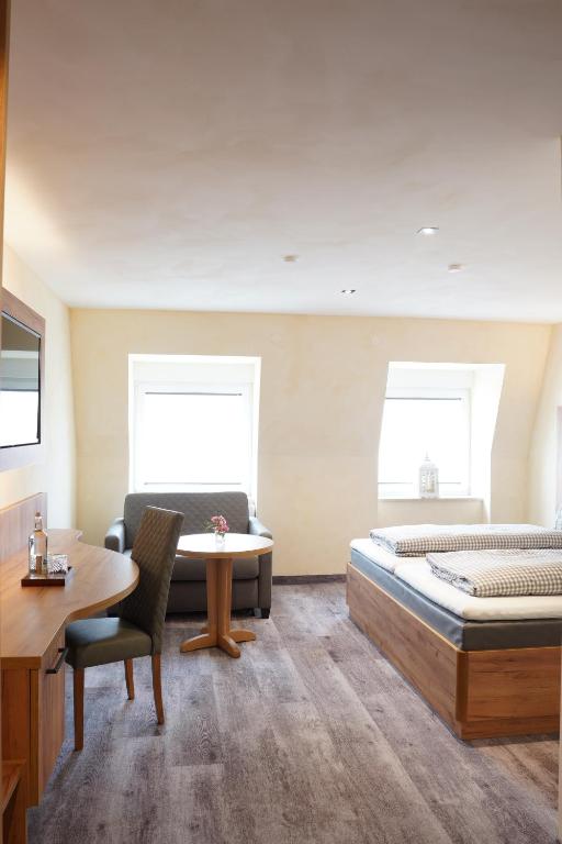 Postel nebo postele na pokoji v ubytování Hotel Heideparadies