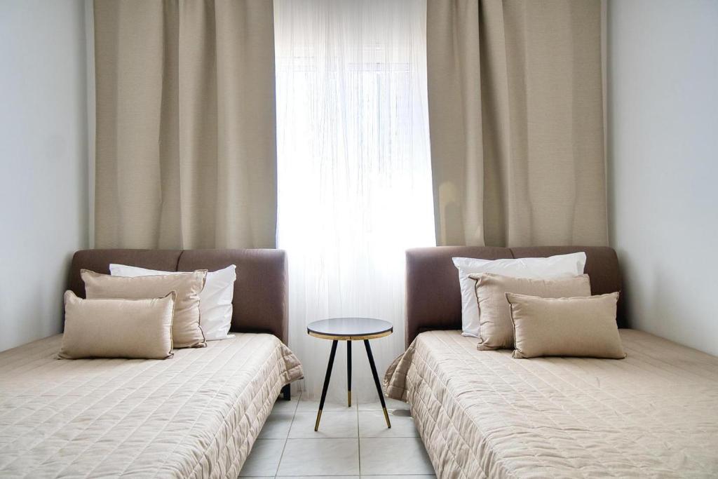 Postel nebo postele na pokoji v ubytování Kings Palace 2 BED