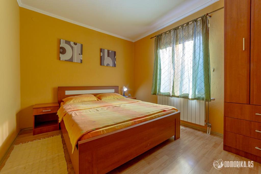 Postel nebo postele na pokoji v ubytování Apartments Andrić