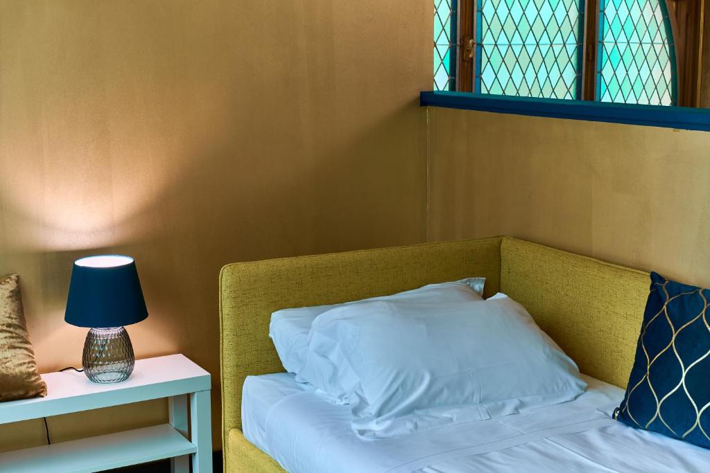 Postel nebo postele na pokoji v ubytování Glam Time