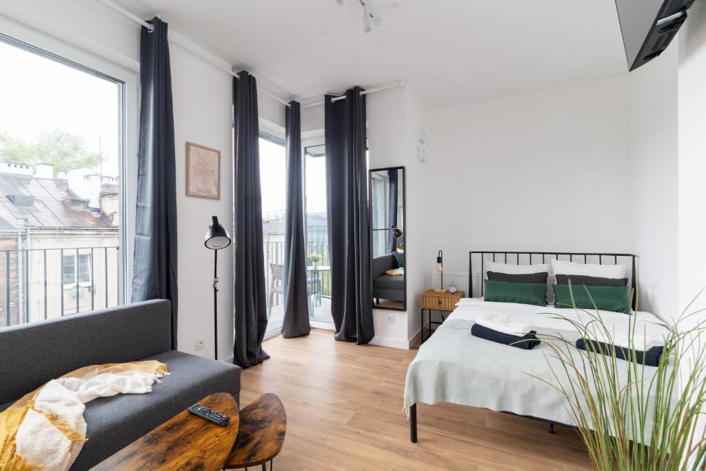 Ένα ή περισσότερα κρεβάτια σε δωμάτιο στο Lineburg Villa Apartments