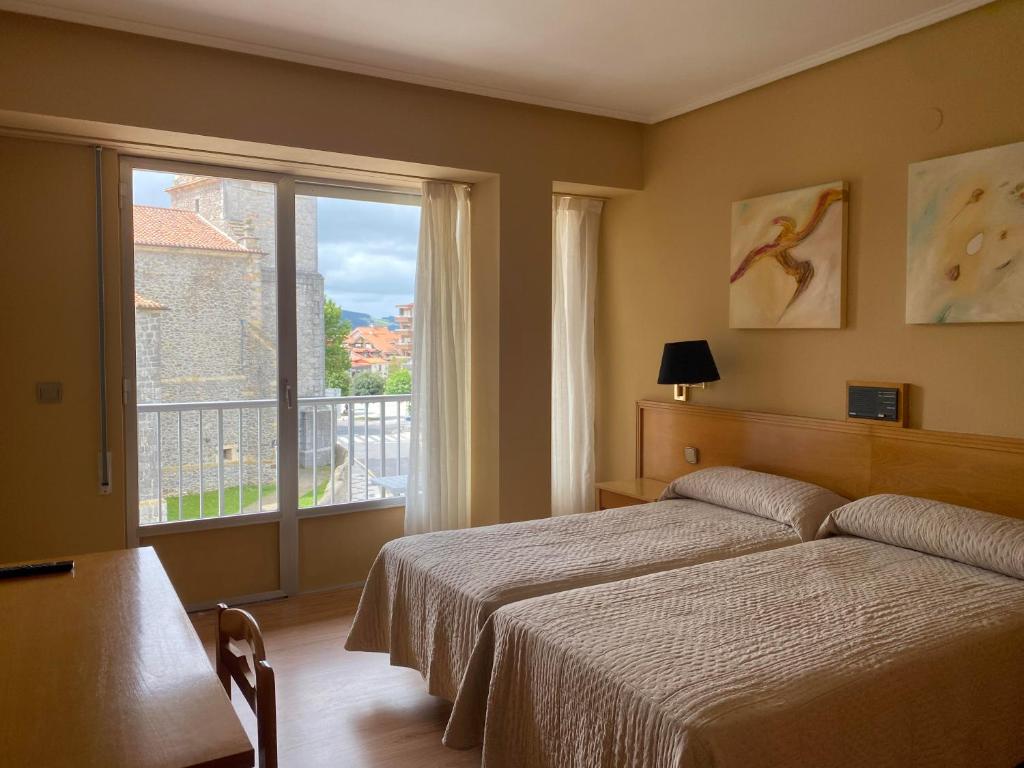 Posteľ alebo postele v izbe v ubytovaní Hotel Zenit Mar