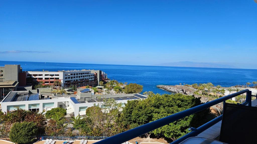 a view of the ocean from a balcony at Perla del Paraiso in Playa Paraiso