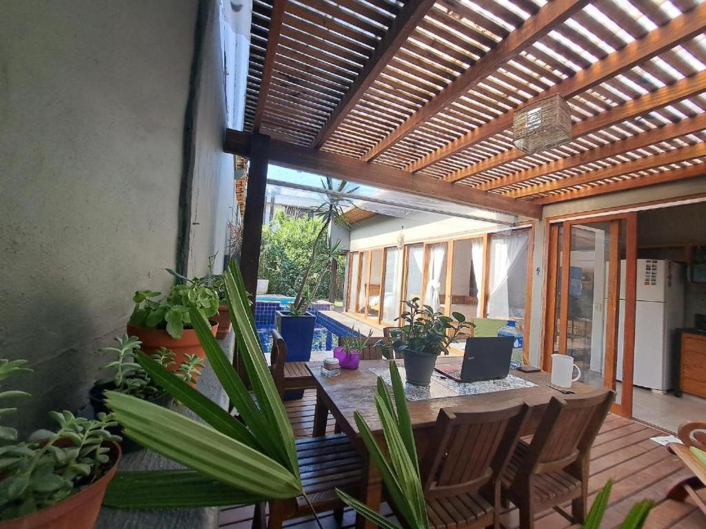 Imagine din galeria proprietății Camburi Beach House - Casa térrea a 50 m da praia în Camburi