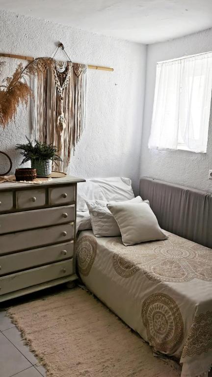 Postel nebo postele na pokoji v ubytování Casa Juana