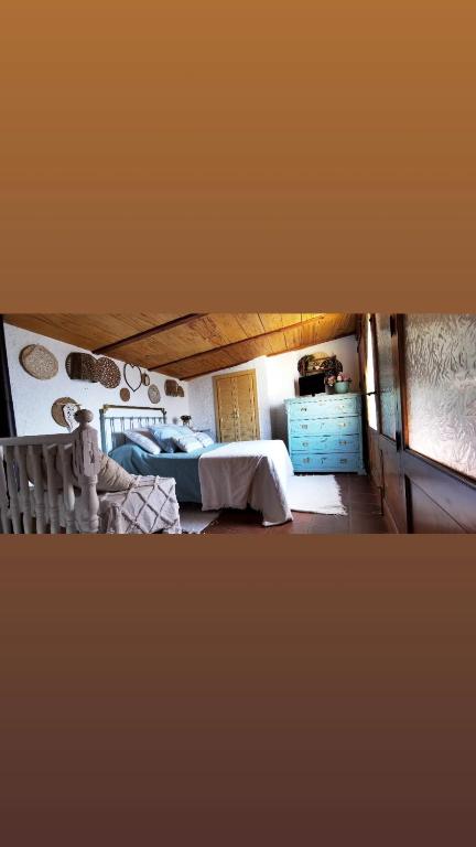 Postel nebo postele na pokoji v ubytování Casa Juana