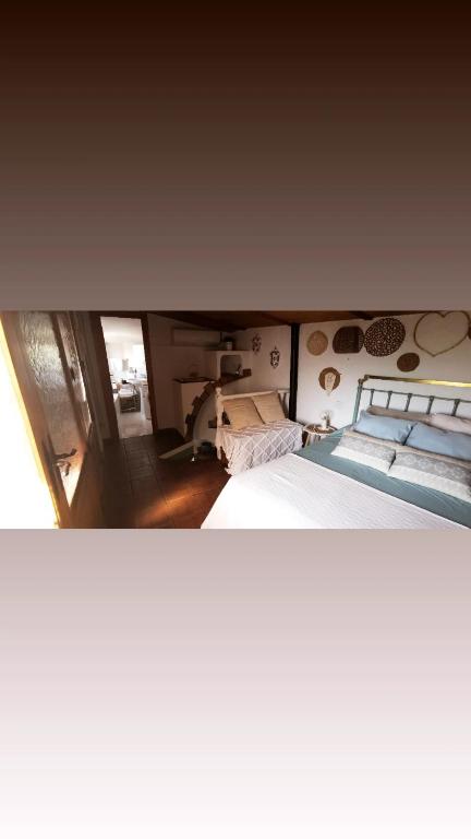 Postel nebo postele na pokoji v ubytování Casa Juana