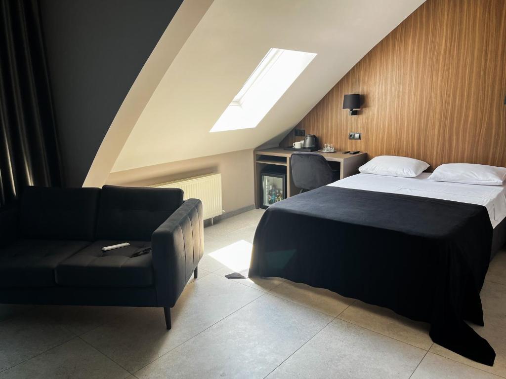 Postel nebo postele na pokoji v ubytování Komilfo Hotel