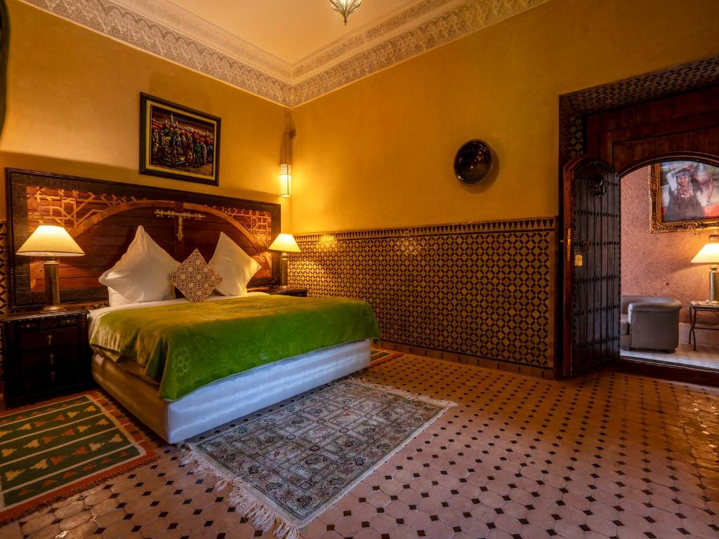 Postel nebo postele na pokoji v ubytování Clé De Sol Riad & SPA