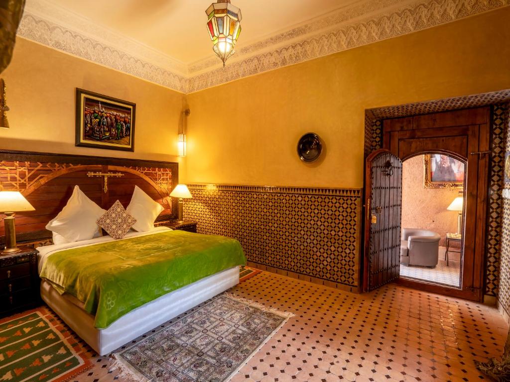 Postel nebo postele na pokoji v ubytování Clé De Sol Riad & SPA
