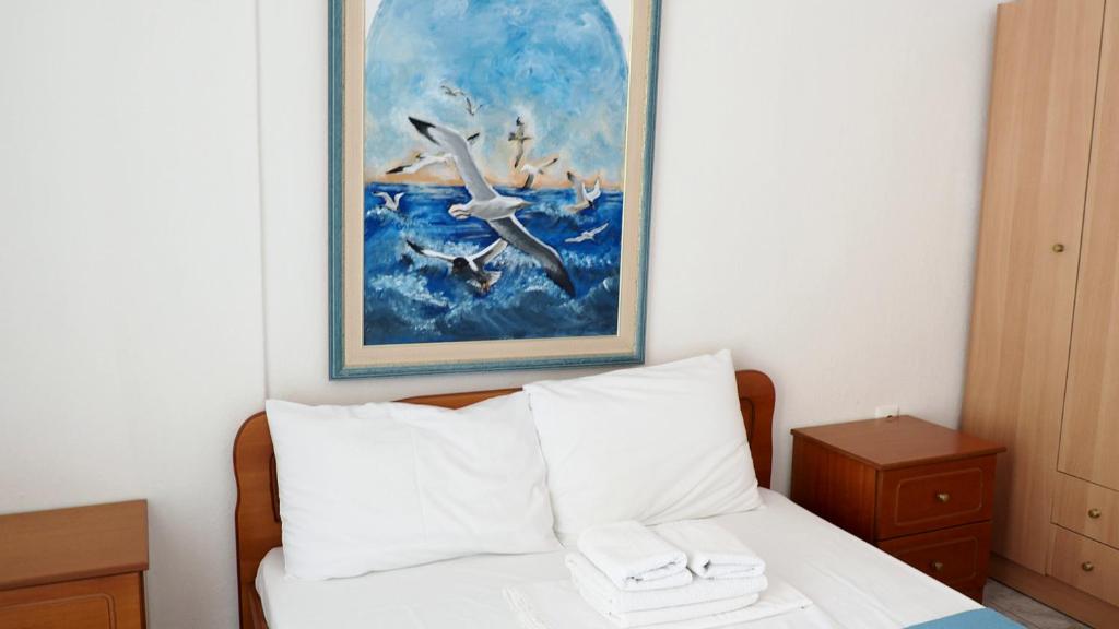 Postel nebo postele na pokoji v ubytování Agapi Apartments